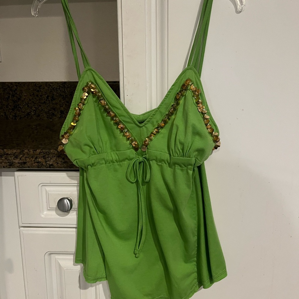 Rock Sold green tank with gold sequins. Size large, but is closer to a medium.